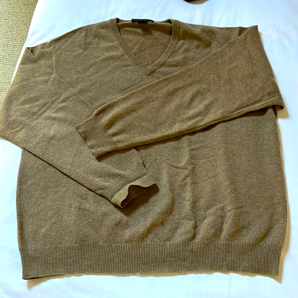 Men’s 100% cashmere  camel color v neck sweater with 3 small holes. See photos